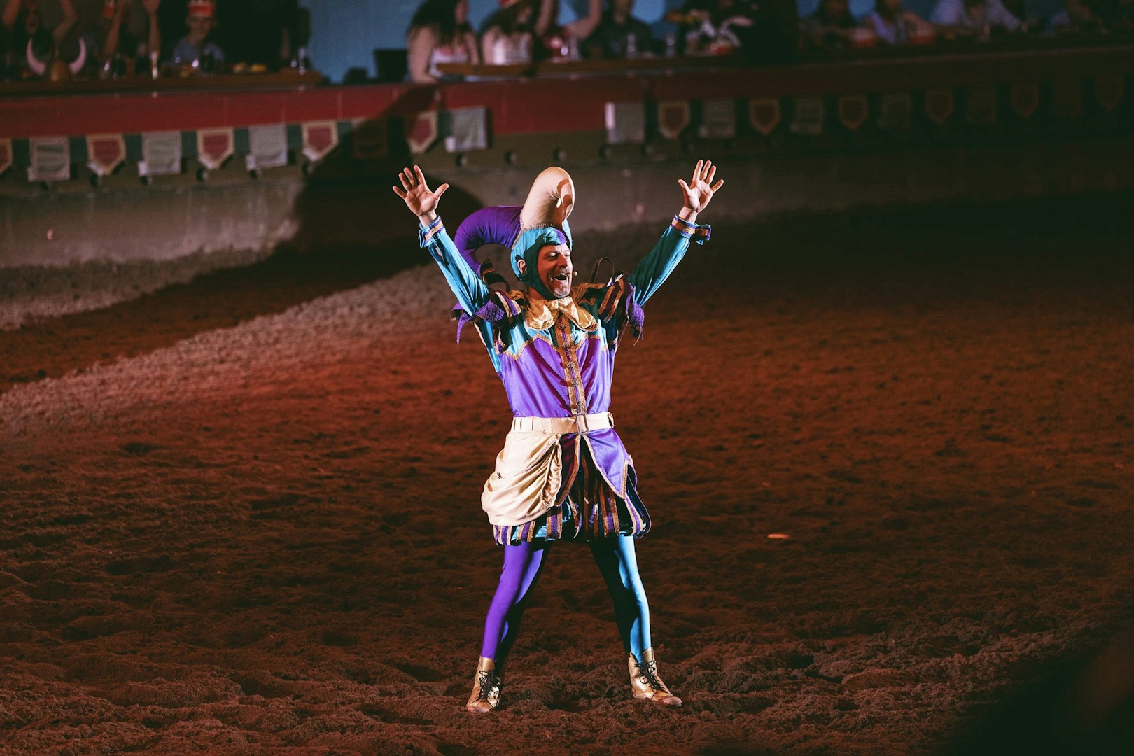 Performer in colorful costume at Tournament of Kings show, Las Vegas.