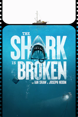 Theater stage with "The Shark is Broken" play set, featuring a mechanical shark and vintage boat.