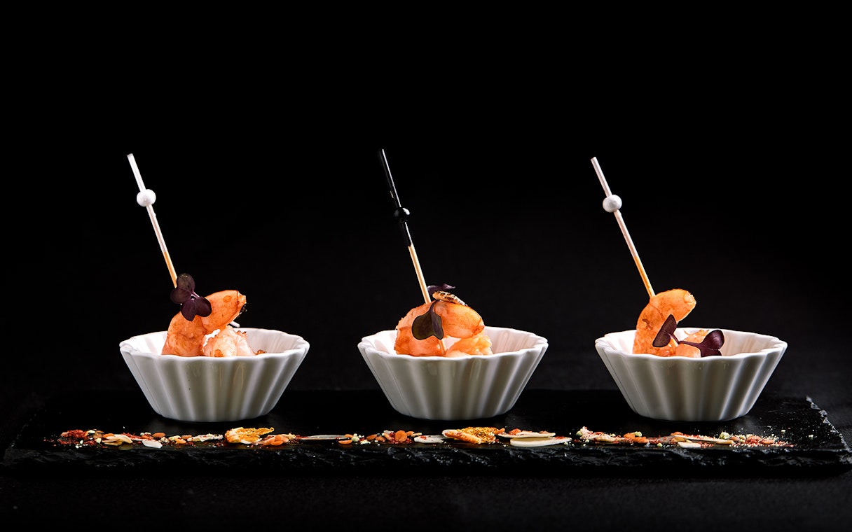 Tiger baby prawns in white bowls at Ginger Restaurant.