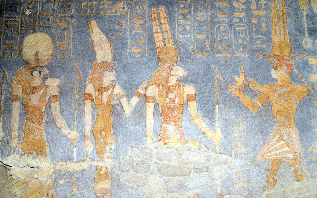 Ancient Egyptian deities depicted in Hathor Temple wall paintings.