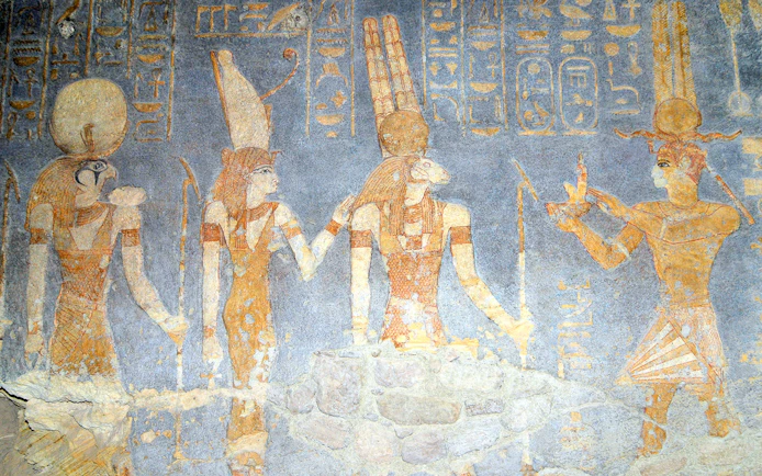 Ancient Egyptian deities depicted in Hathor Temple wall paintings.