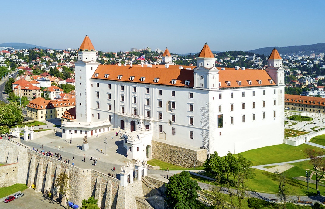 Bratislava Castle with red rooftops overlooking the cityscape in Slovakia.