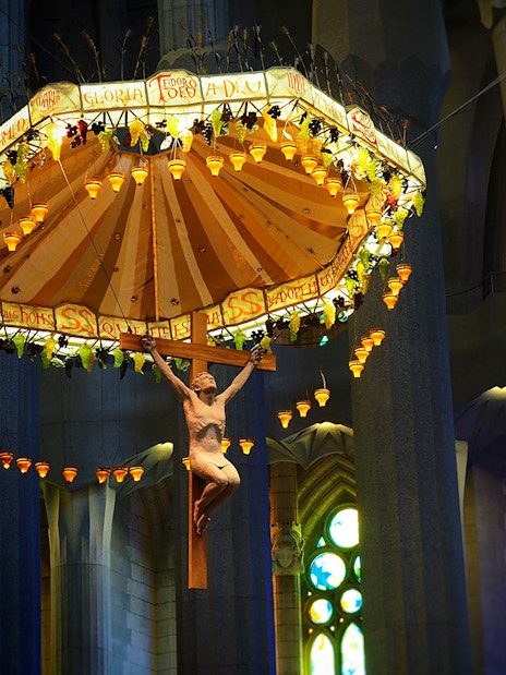 Crucifix and canopy inside Sagrada Familia, Barcelona.