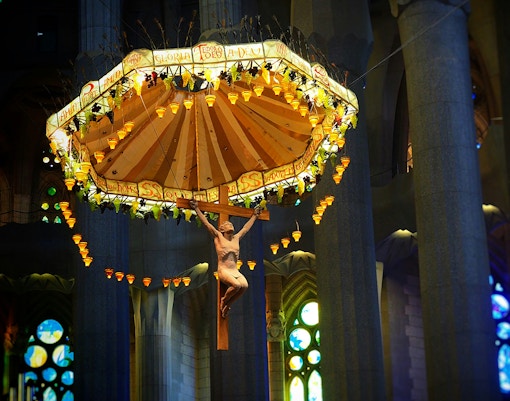 Crucifix and canopy inside Sagrada Familia, Barcelona.