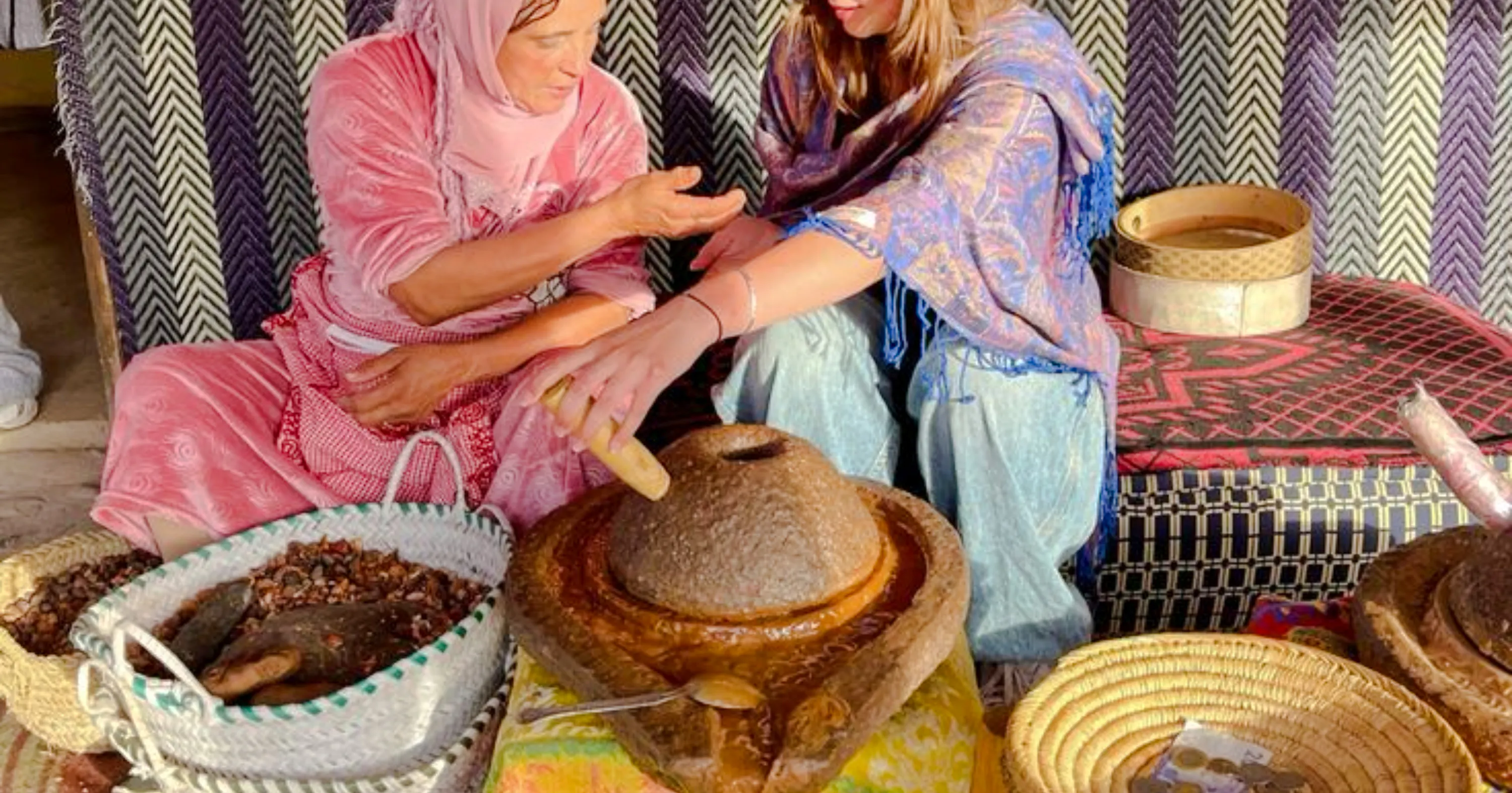 Traditional argan oil extraction demonstration in Essaouira countryside.