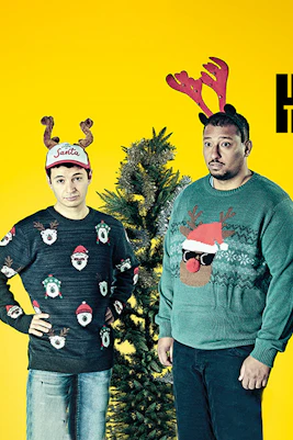 Sons of the Prophet play poster with two men in festive sweaters, Hampstead Theatre.