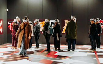 Visitors wearing VR headsets at Pompeia experience, IDEAL Barcelona.