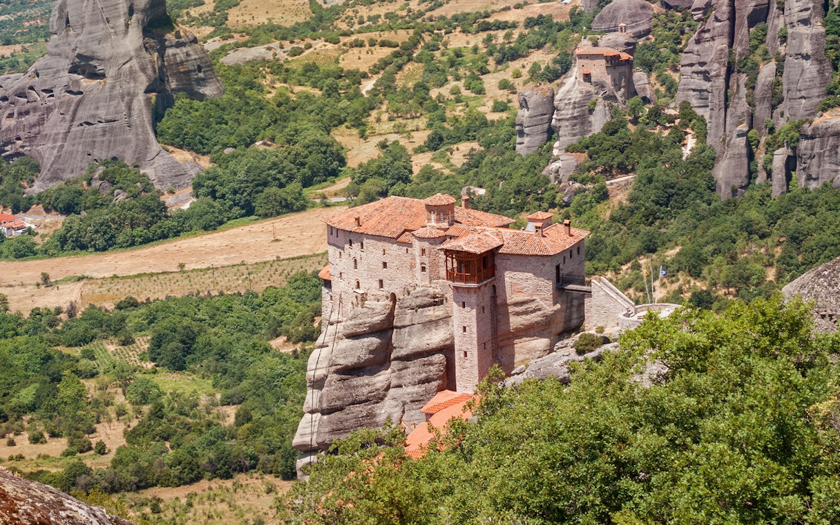 Monastery perched on rock formations in Meteora, Greece, seen during a private day tour from Athens.
