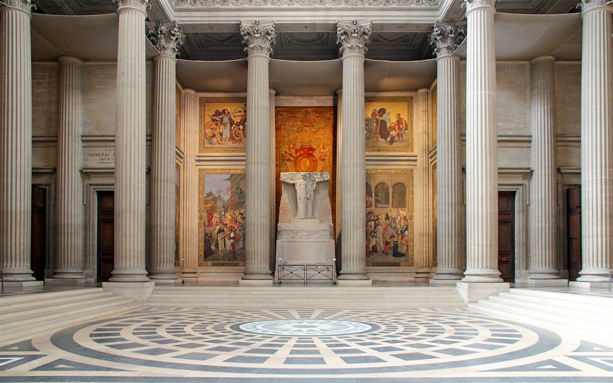 Pantheon interior with columns and murals, Paris.