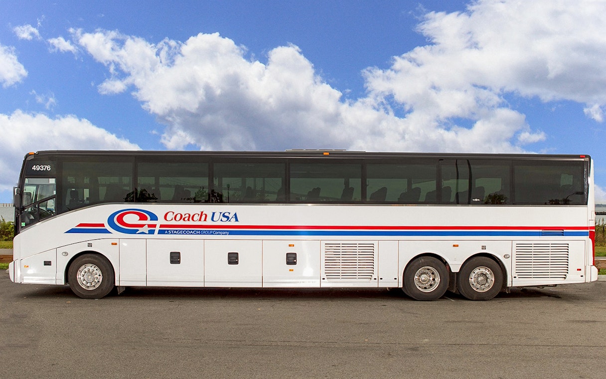 Coach USA bus for Newark Airport to Manhattan route.