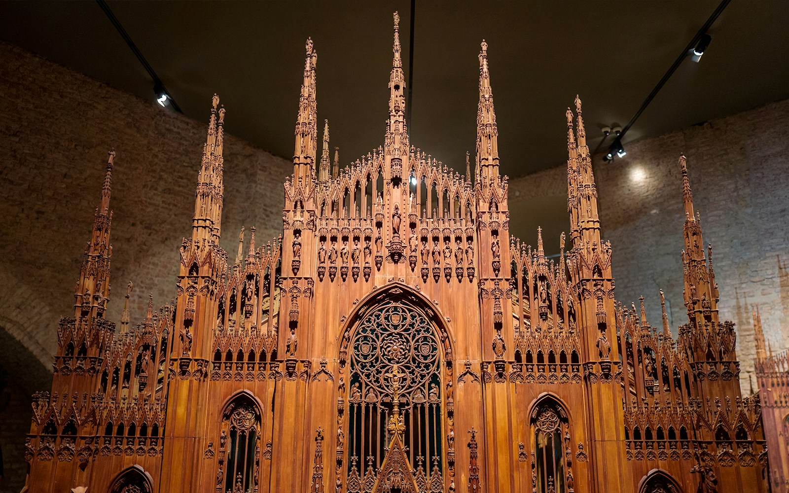 Wooden model of Milan Duomo at the museum, showcasing intricate architectural details.