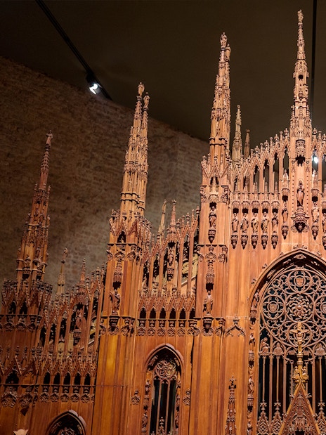 Wooden model of Milan Duomo at the museum, showcasing intricate architectural details.