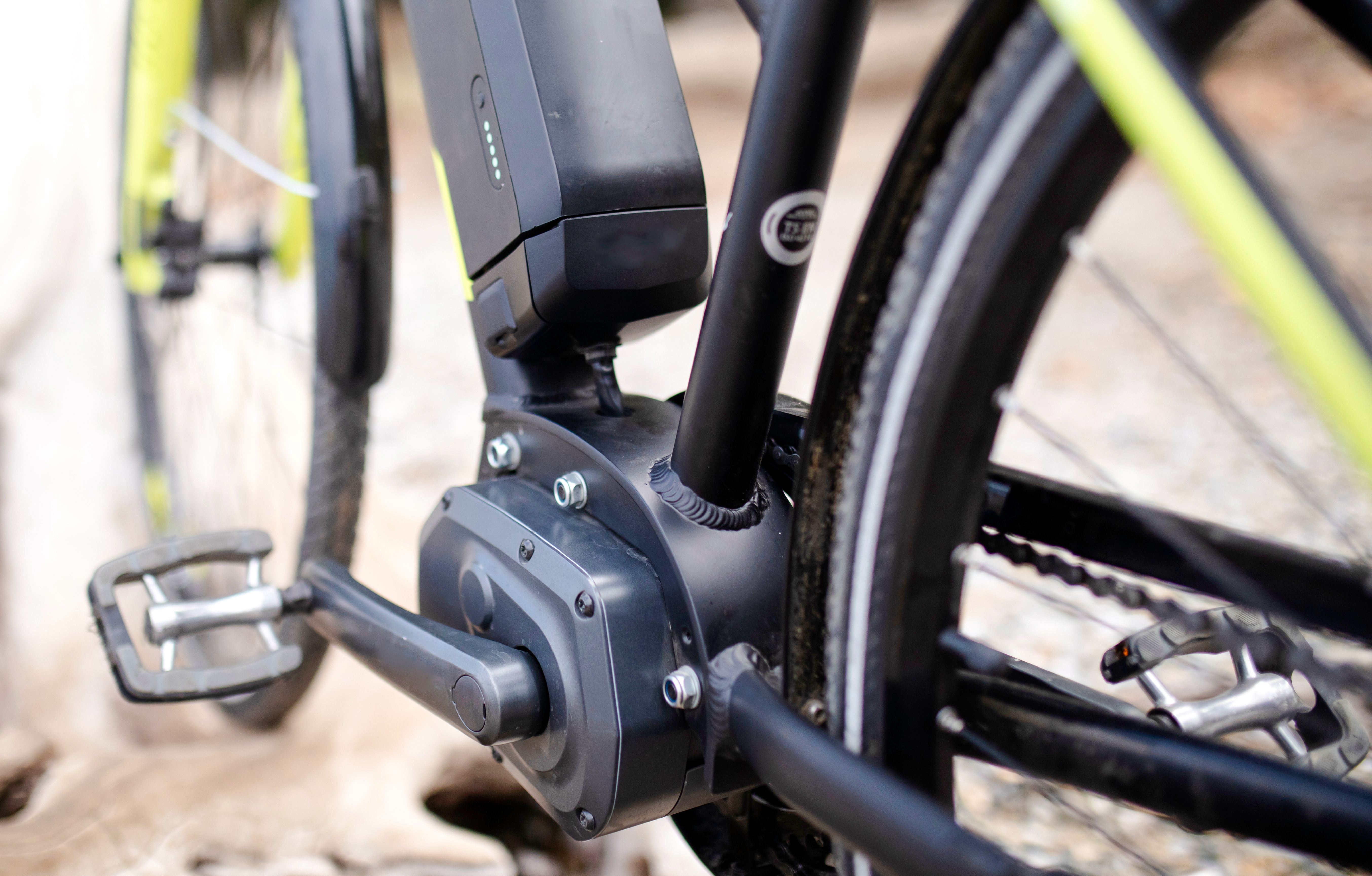 E-bike pedal and motor close-up view.