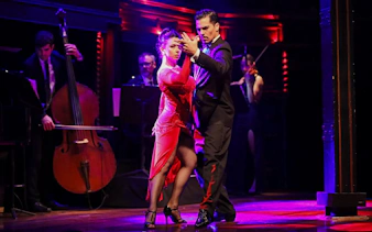 Tango dancers performing at El Querandí Tango Show in Buenos Aires.