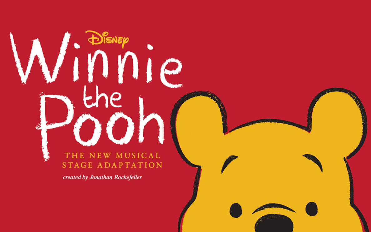 Winnie the Pooh musical adaptation poster with Pooh's face and title text.