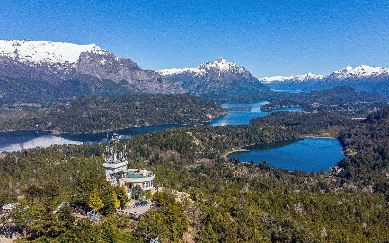 Llao Llao region with lakes, forests, and snow-capped mountains in the background.