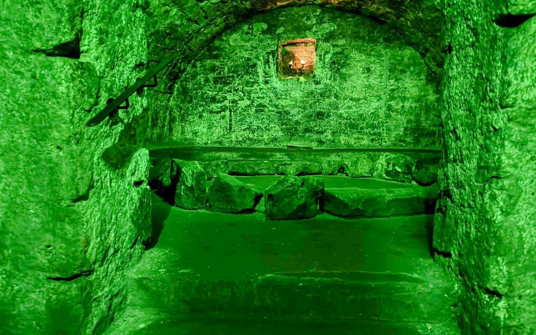 Underground stone chamber on the Terror Tour in Edinburgh.