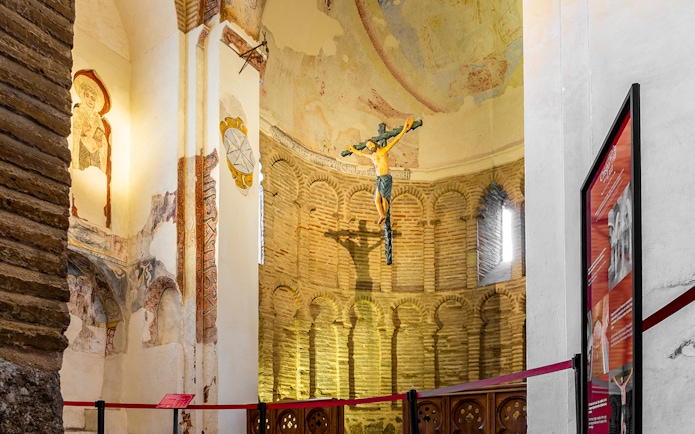 Mudejar-style apse with Holy Cross and faded frescos in Mosque of Cristo de la Luz, Toledo, Spain.