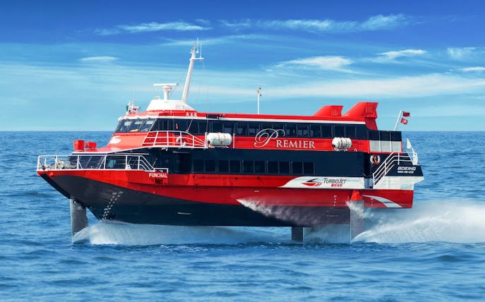 Turbojet ferry on water for HK to Macau Outer Harbour round trip.