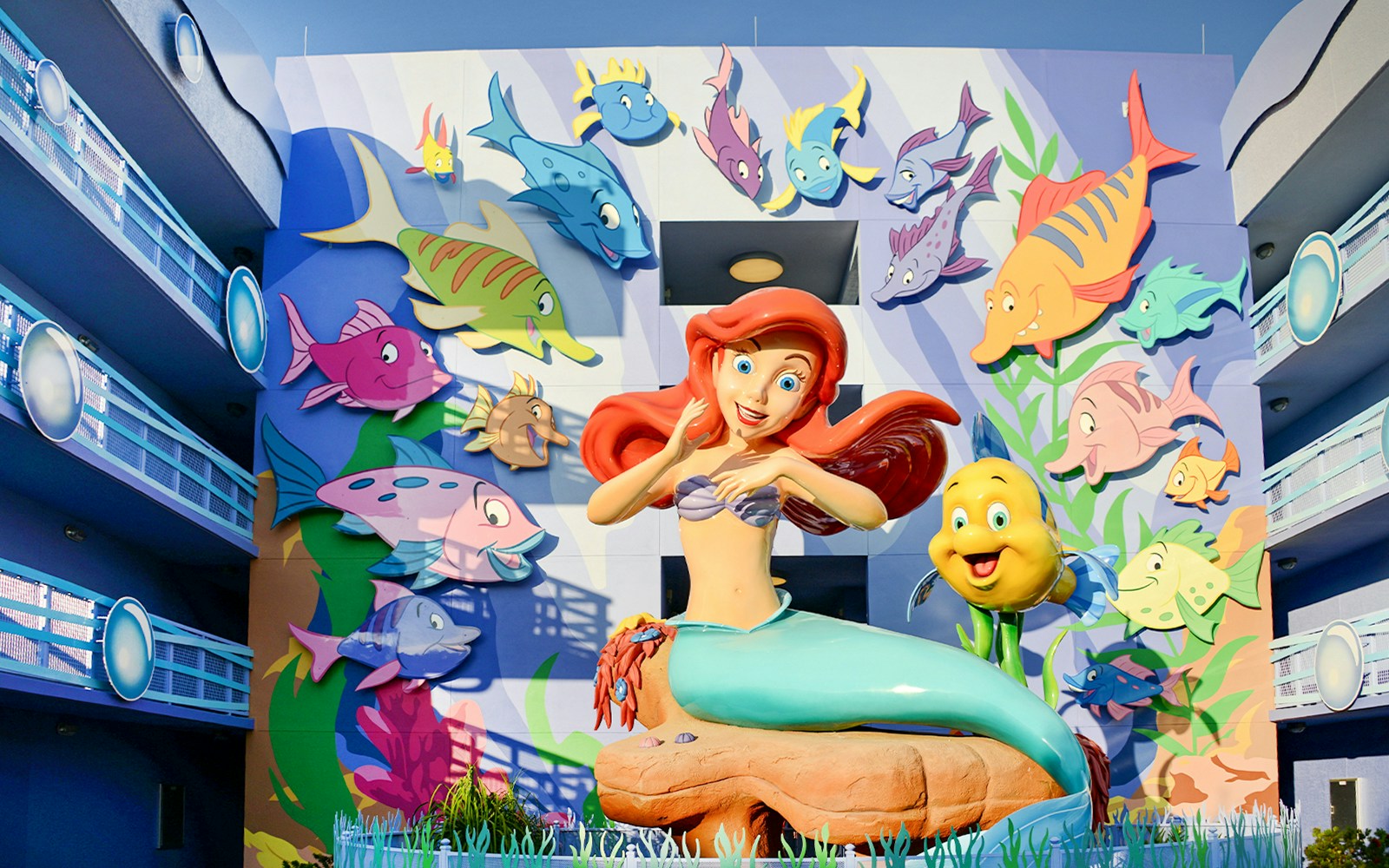 Ariel and Flounder statue at The Little Mermaid – A Musical Adventure, Walt Disney Resort, Orlando.