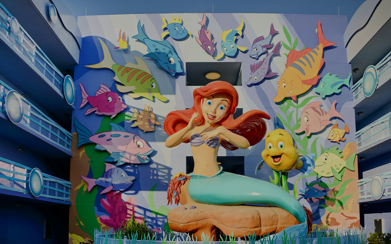 Ariel and Flounder statue at The Little Mermaid – A Musical Adventure,