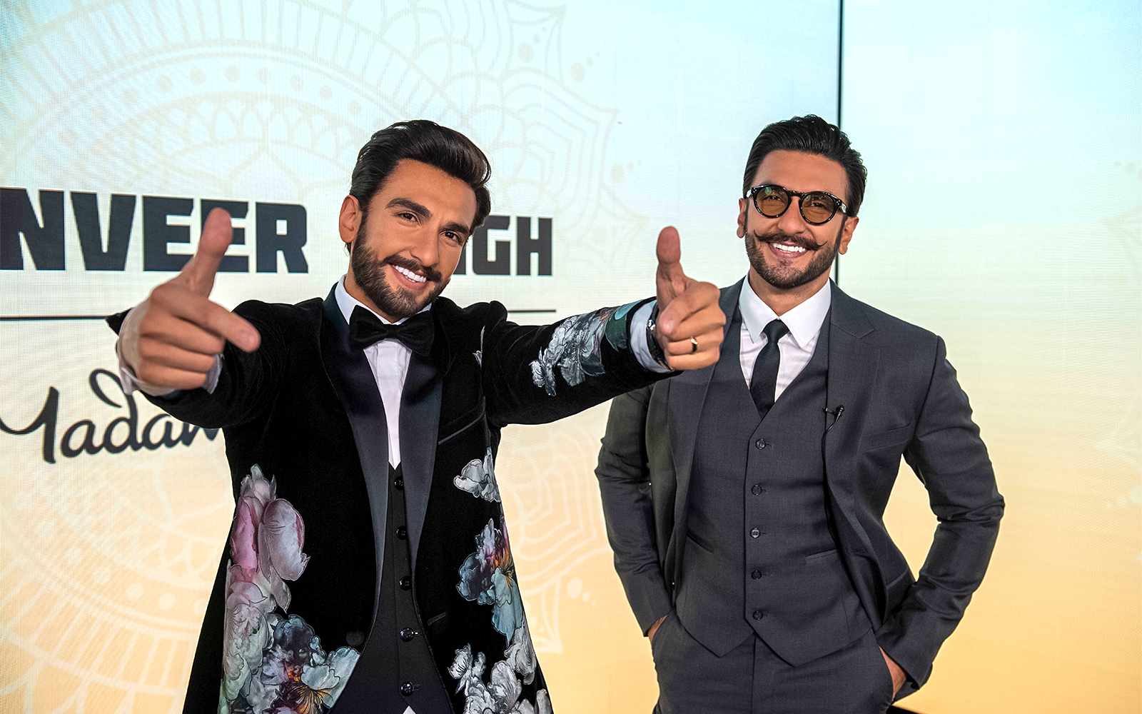 Wax figures at Madame Tussauds Singapore exhibit.