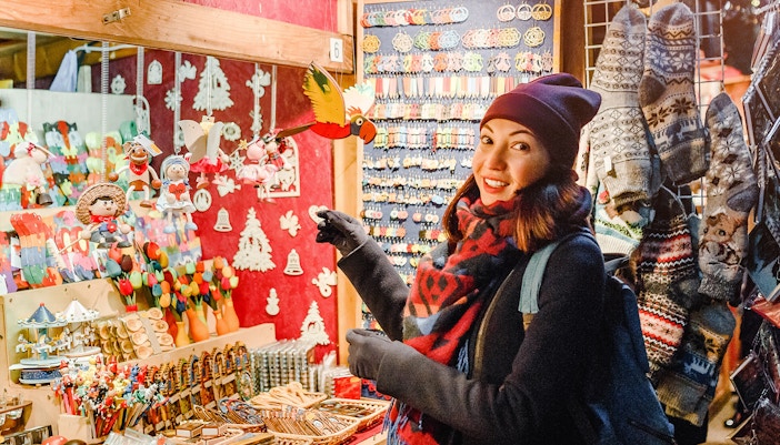 Christmas market stalls with festive lights in a barcelona