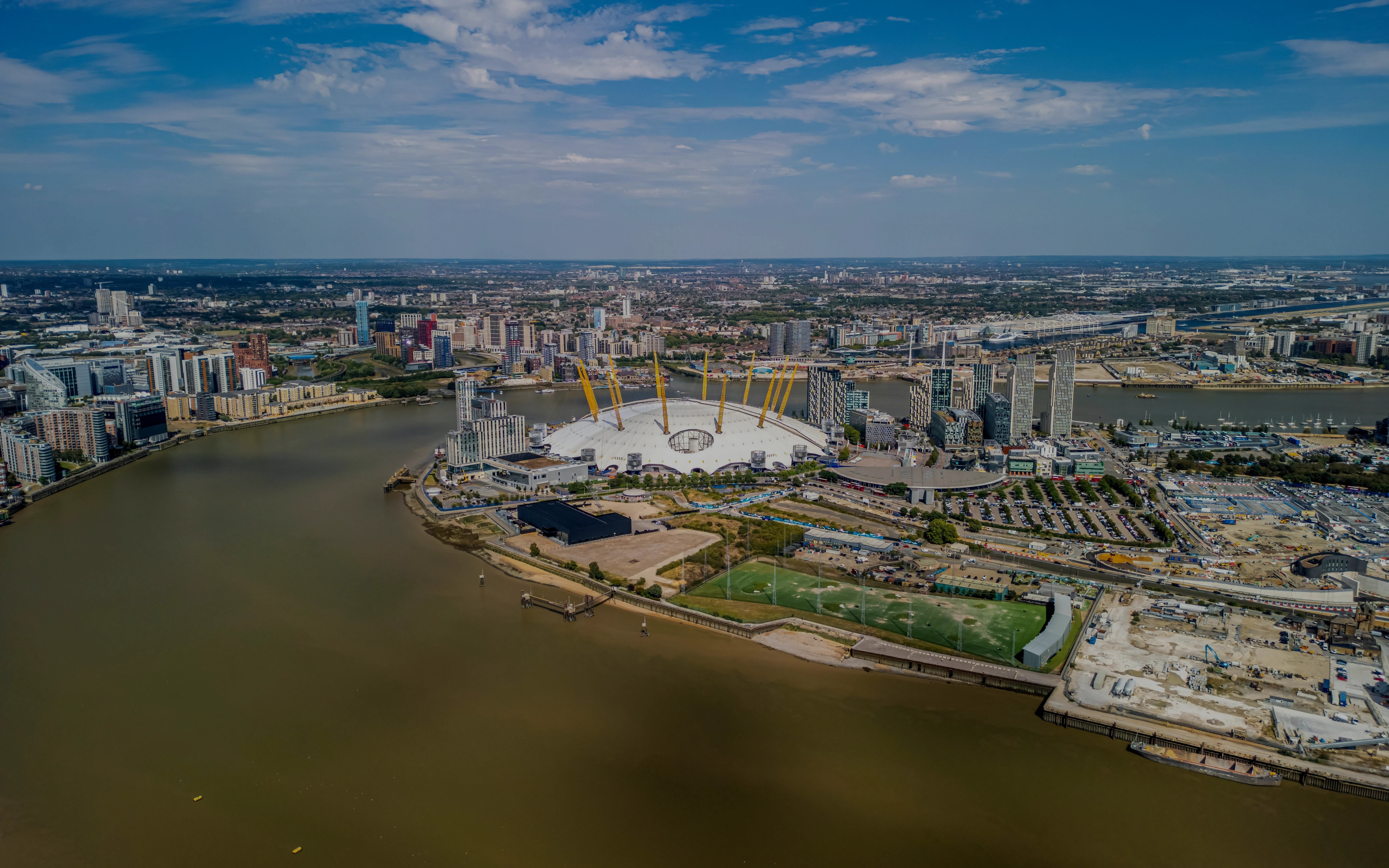 Aerial view of the O2 Arena and Thames River in Greenwich, South East London.