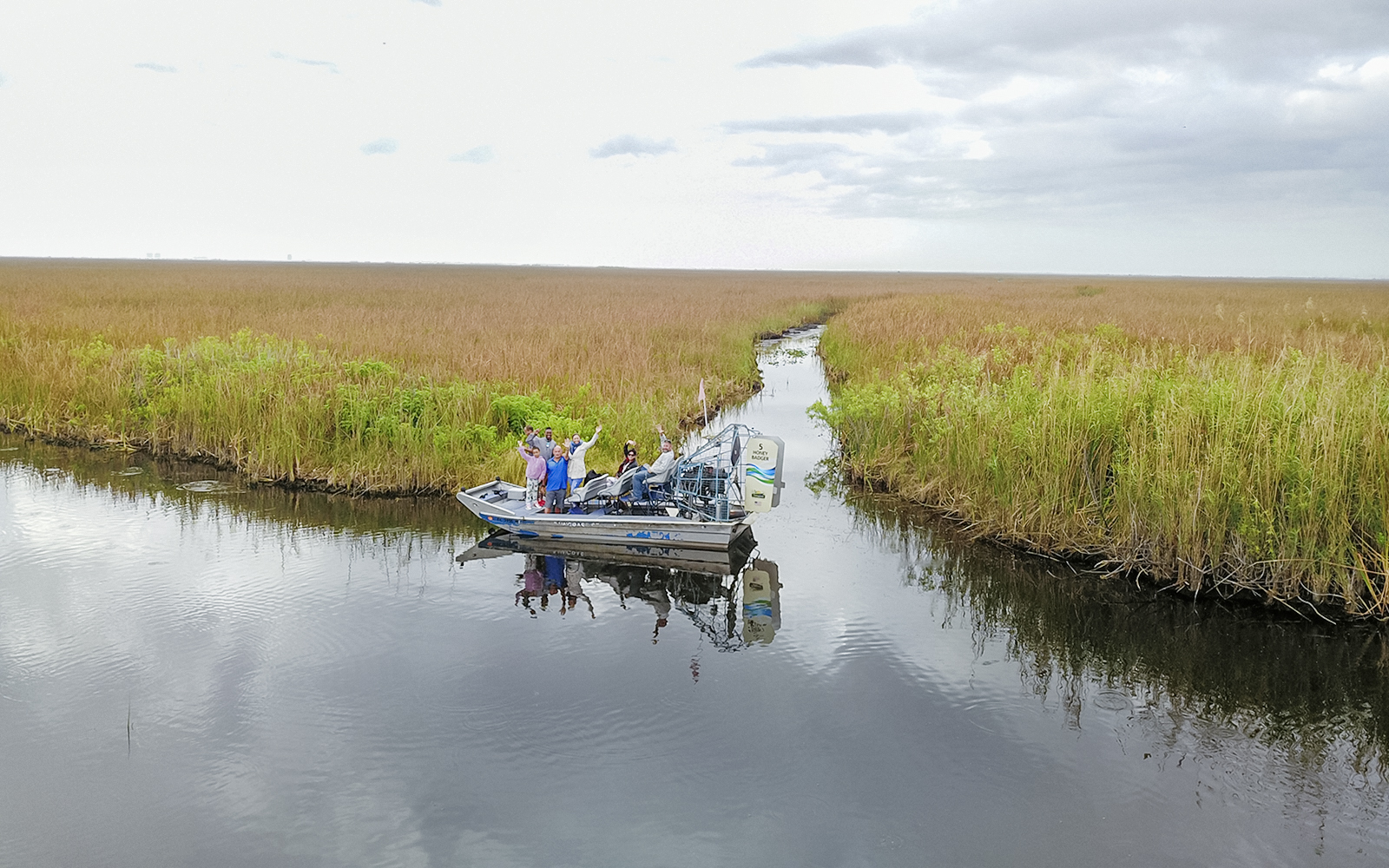 Airboat with tourists in Everglades at Sawgrass Recreation Park.