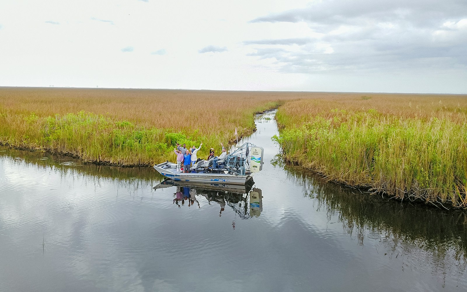 Airboat with tourists in Everglades at Sawgrass Recreation Park.
