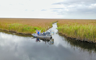 Airboat with tourists in Everglades at Sawgrass Recreation Park.