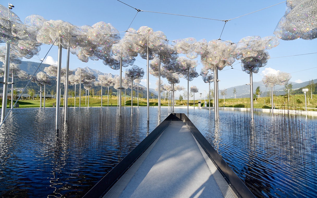 Pathway through crystal cloud installation at Swarovski Crystal Worlds, Austria.