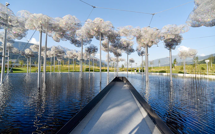 Pathway through crystal cloud installation at Swarovski Crystal Worlds, Austria.