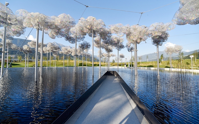 Pathway through crystal cloud installation at Swarovski Crystal Worlds, Austria.