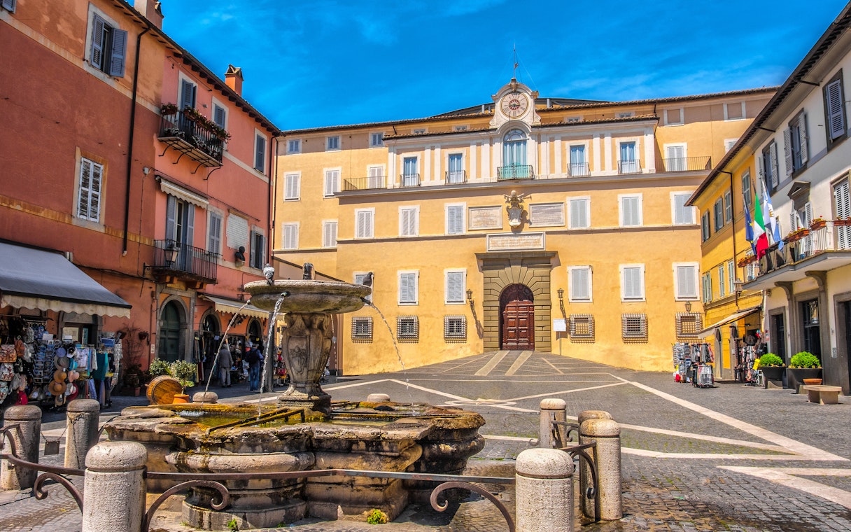 Facade of Castel Gandolfo with fountain in Rome, Italy.