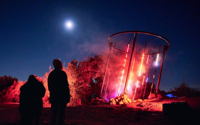 Guests viewing illuminated display at Astra Lumina, Currumbin Wildlife Sanctuary.