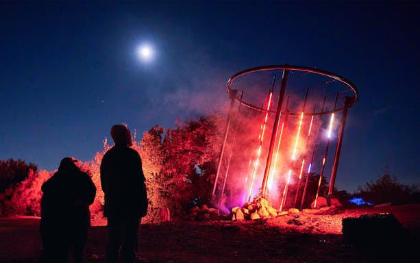 Guests viewing illuminated display at Astra Lumina, Currumbin Wildlife Sanctuary.