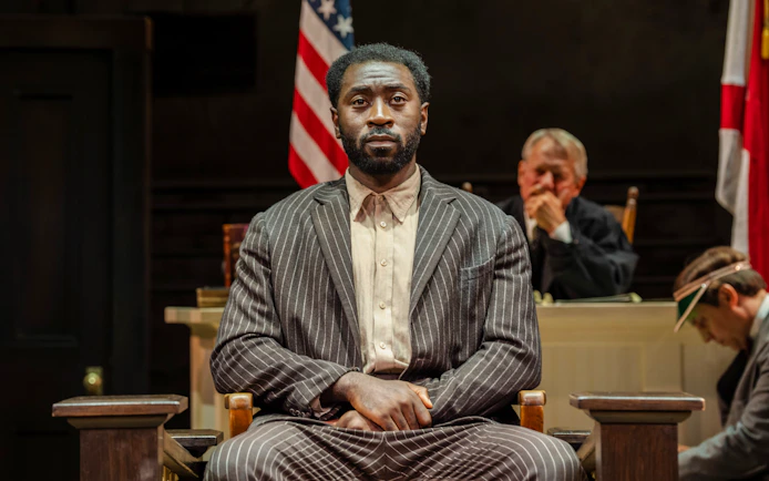 Actor in courtroom scene from "To Kill a Mockingbird" West End show.