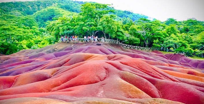 Chamarel 7 Coloured Earth Dunes with tourists on a viewing platform, Mauritius.
