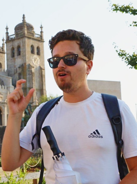 Tourist guide explaining Porto Cathedral in Porto, Portugal.