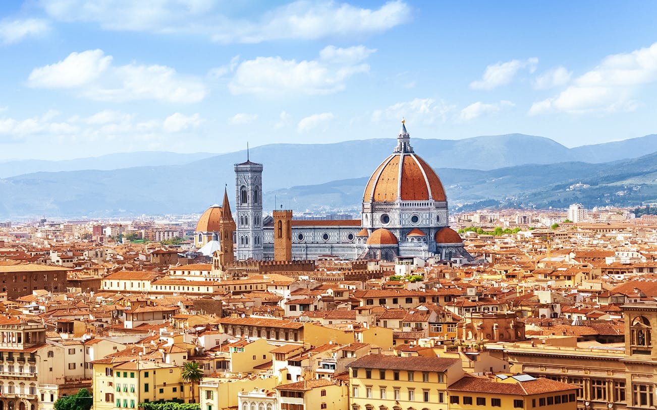Florence skyline featuring the iconic Duomo and surrounding cityscape.
