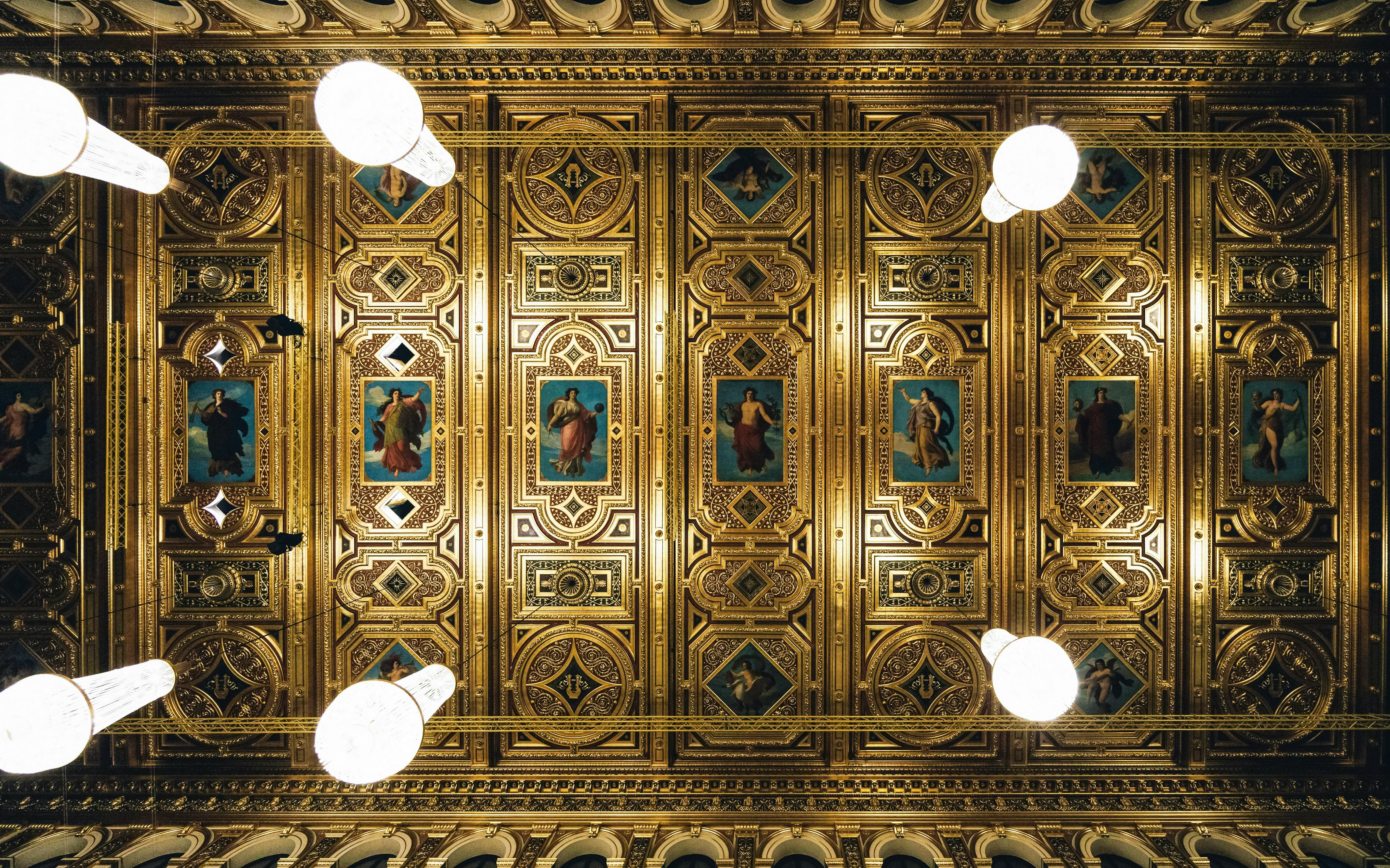Ornate ceiling of concert hall for Mozart Orchestra performance.
