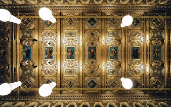 Ornate ceiling of concert hall for Mozart Orchestra performance.