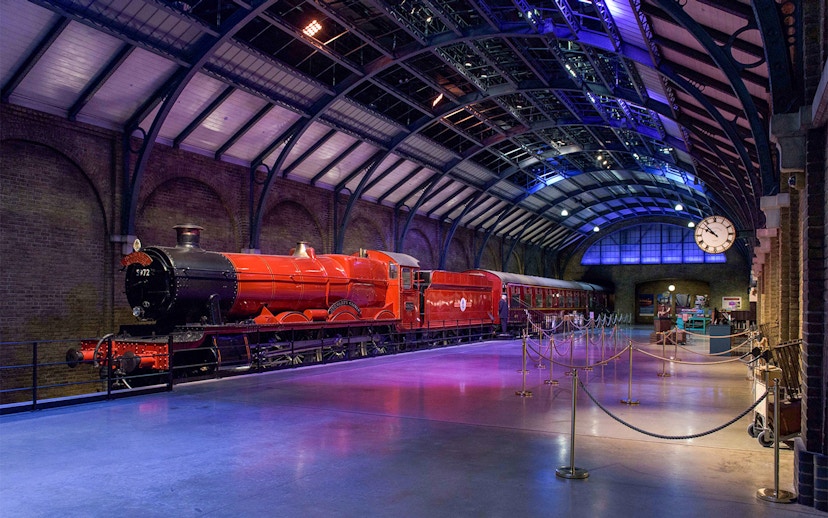 Red steam train at Platform 9 3/4, Warner Bros. Harry Potter Studio Tour.