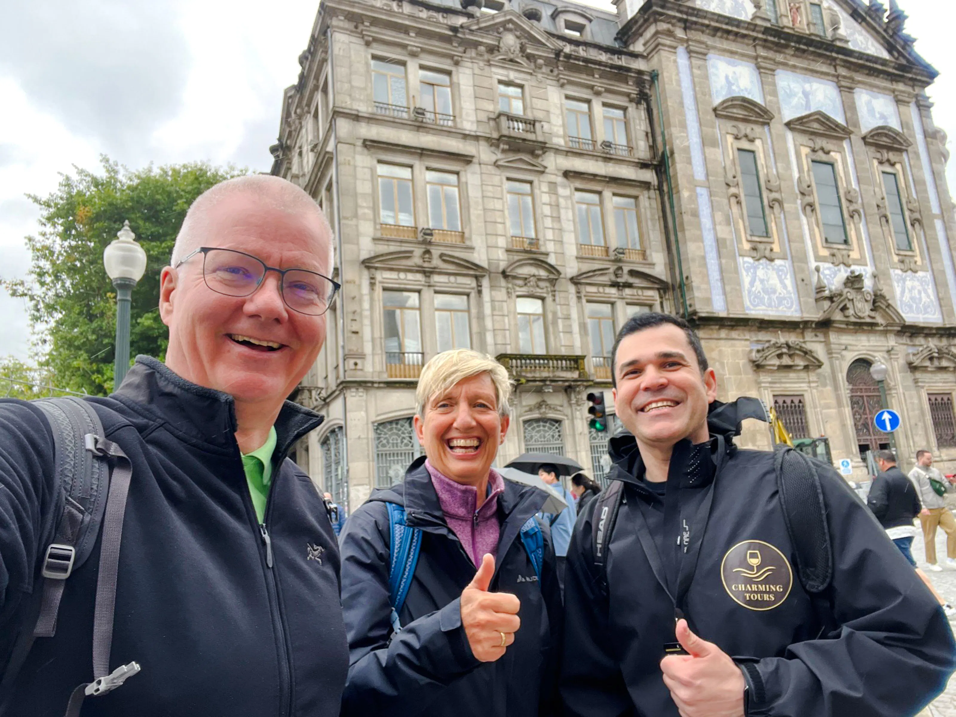 Group on walking tour near Livraria Lello, Porto.