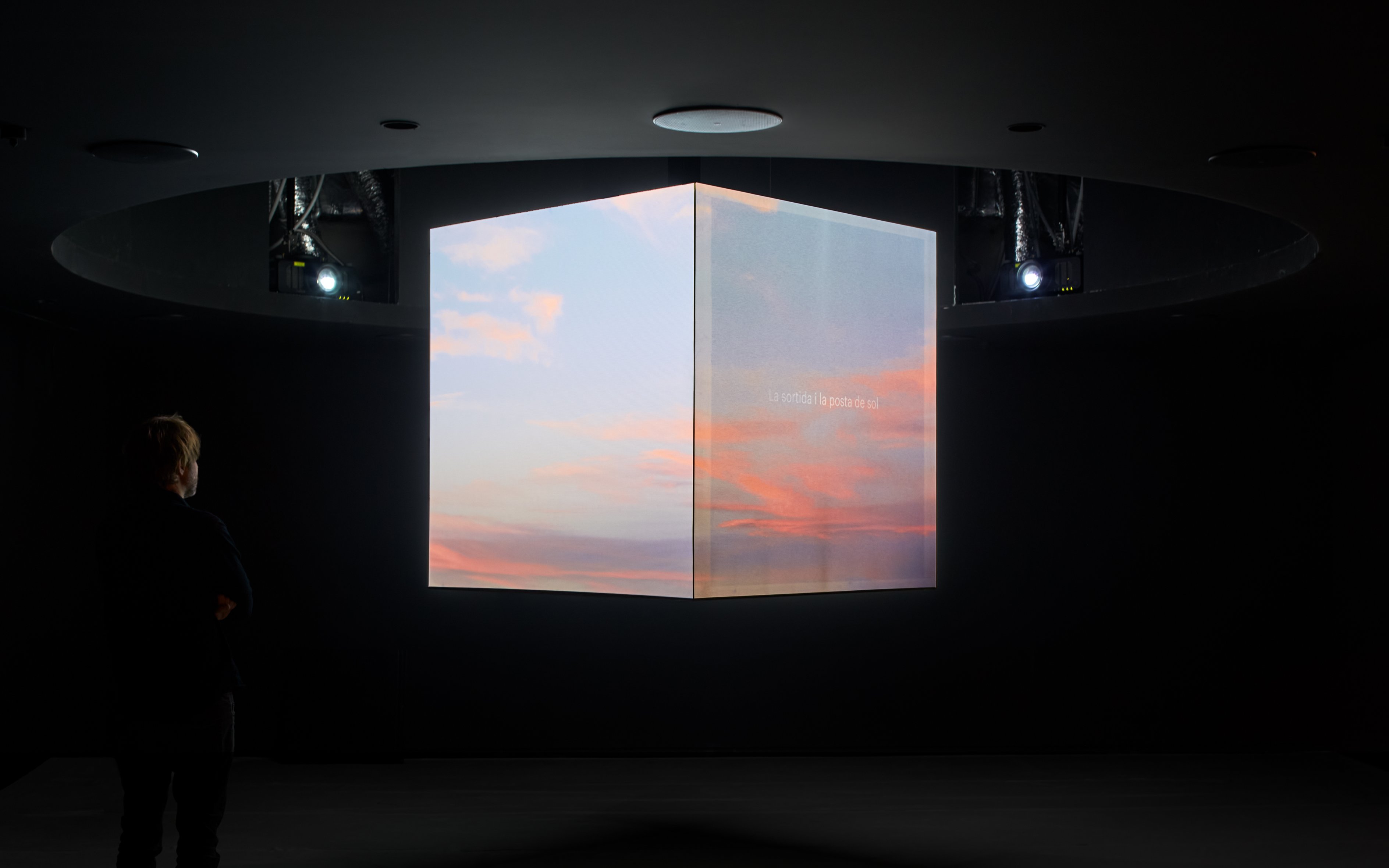 Interactive digital display inside Glories Skyline Tower showing sunset visuals.