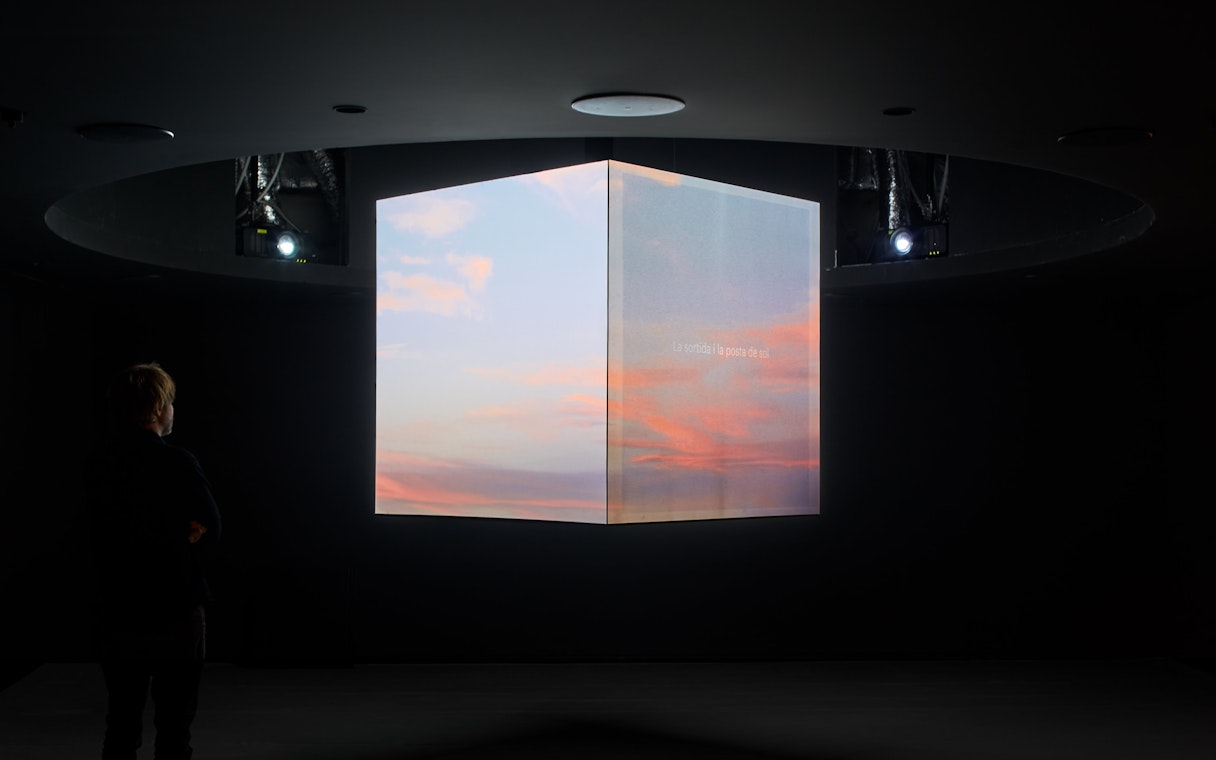 Interactive digital display inside Glories Skyline Tower showing sunset visuals.