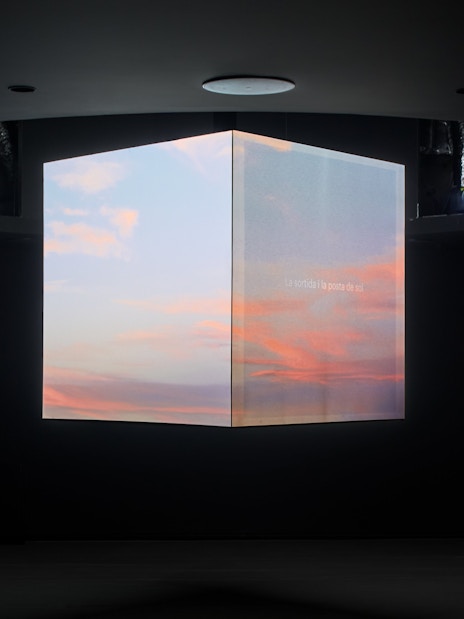 Interactive digital display inside Glories Skyline Tower showing sunset visuals.