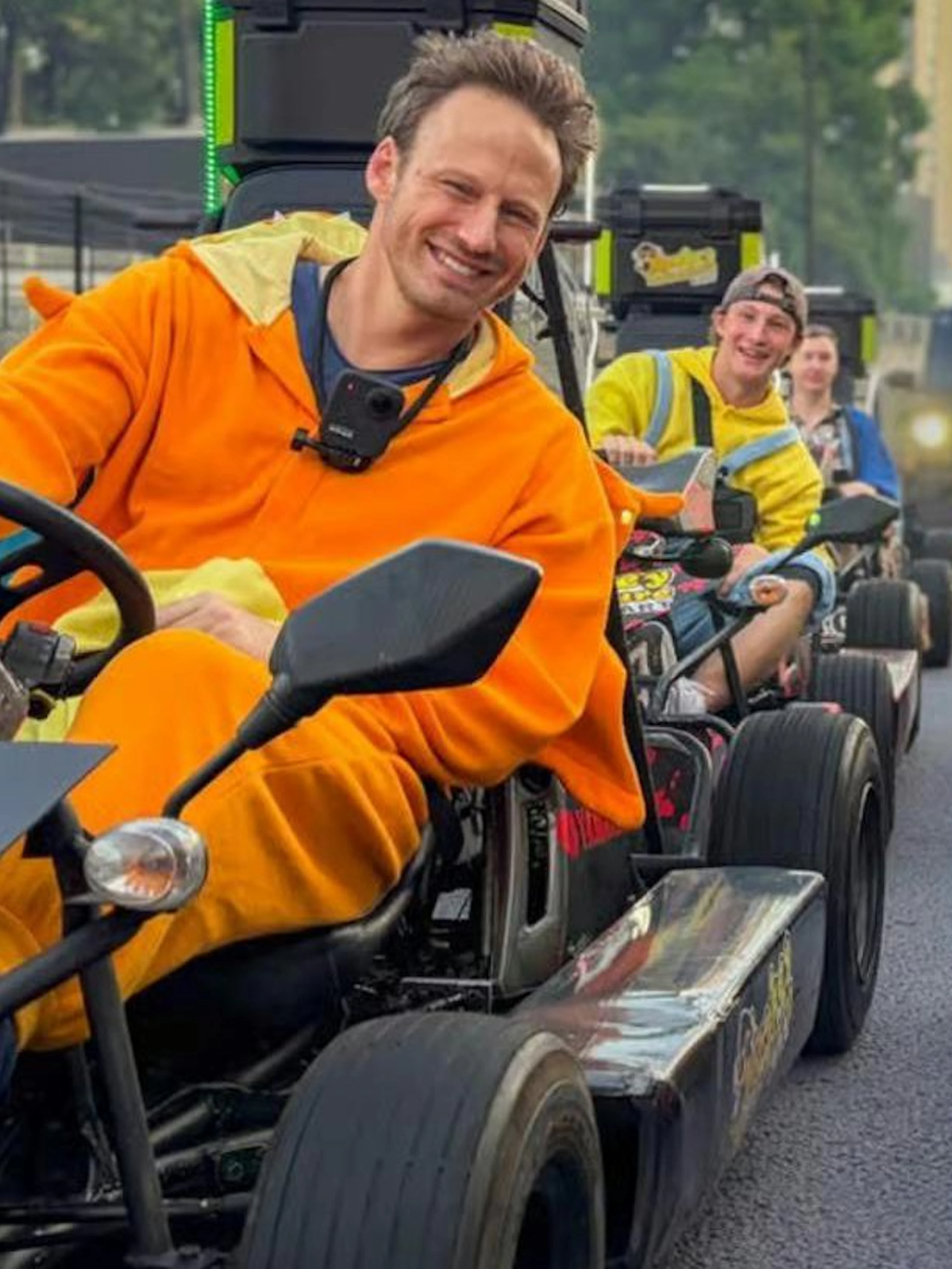 Go-kart riders in costumes enjoying Shibuya Crossing 75-min experience by Monkey Kart in Tokyo.