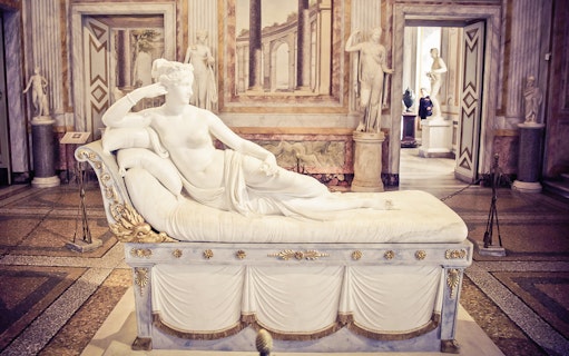 Sculpture of reclining figure in Borghese Gallery, Rome, during half-day tour.